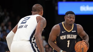 MEMPHIS, TENNESSEE - OCTOBER 25: Zion Williamson #1 of the New Orleans Pelicans handles the ball against Xavier Tillman Sr. #2 of the Memphis Grizzlies during the second half at FedExForum on October 25, 2023 in Memphis, Tennessee. NOTE TO USER: User expressly acknowledges and agrees that, by downloading and or using this photograph, User is consenting to the terms and conditions of the Getty Images License Agreement. Justin Ford/Getty Images/AFP (Photo by Justin Ford / GETTY IMAGES NORTH AMERICA / Getty Images via AFP)