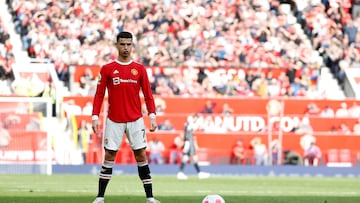 Soccer Football - Premier League - Manchester United v Norwich City - Old Trafford, Manchester, Britain - April 16, 2022 Manchester United's Cristiano Ronaldo before he scores their third goal from a free kick and his hat-trick REUTERS/Craig Brough EDITORIAL USE ONLY. No use with unauthorized audio, video, data, fixture lists, club/league logos or 'live' services. Online in-match use limited to 75 images, no video emulation. No use in betting, games or single club /league/player publications.  Please contact your account representative for further details.