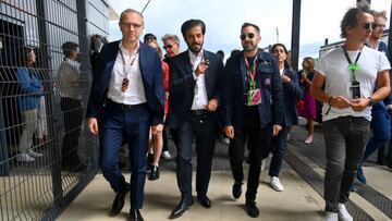 NORTHAMPTON, ENGLAND - JULY 03: Stefano Domenicali, CEO of the Formula One Group, Mohammed ben Sulayem, FIA President, and Dynamo talk prior to the F1 Grand Prix of Great Britain at Silverstone on July 03, 2022 in Northampton, England. (Photo by Dan Mullan - Formula 1/Formula 1 via Getty Images)