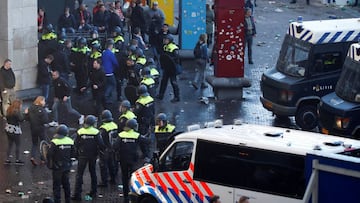 Soccer Football - Champions League Quarter Final First Leg - Ajax Amsterdam v Juventus - Johan Cruijff Arena, Amsterdam, Netherlands - April 10, 2019  Police and fans outside the stadium before the match  REUTERS/Wolfgang Rattay