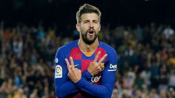 Piqué celebrando un gol ante el Valencia en un partido de LaLiga