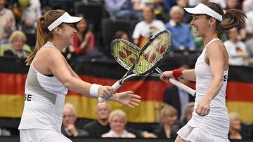 Belinda Bencic, left, celebrates with Martina Hingis during the Fed Cup.