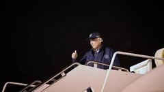 US President Joe Biden boards Air Force One as he departs Dover, Delaware.