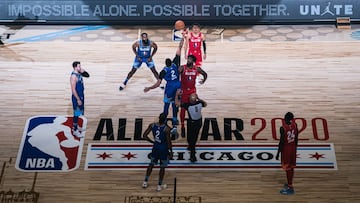 CHICAGO, ILLINOIS - FEBRUARY 16: Joel Embiid #24 of Team Giannis and Anthony Davis #2 of Team LeBron reaches for the ball during the 69th NBA All-Star Game on February 16, 2020 at the United Center in Chicago, Illinois. (Photo by Lampson Yip - Clicks Images/Getty Images)