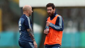 FILE PHOTO: Football Soccer - Argentina's national soccer team training - World Cup 2018 Qualifiers - Buenos Aires, Argentina - August 28, 2017 - Argentina's head coach Jorge Sampaoli talks to Lionel Messi during a training session ahead of the