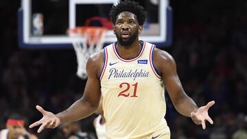 (FILES) In this file photo taken on December 25, 2019, Joel Embiid of the Philadelphia 76ers reacts after scoring during the first half of the game against the Milwaukee Bucks in Philadelphia, Pennsylvania. NOTE TO USER: User expressly acknowledges and agrees that, by downloading and or using this photograph, User is consenting to the terms and conditions of the Getty Images License Agreement.   Sarah Stier/Getty Images/AFP - Embiid returned to full workouts on January 24, 2020, with the NBA club and will be re-evaluated Monday, three weeks after undergoing surgery for a torn left ringfinger ligament. The 25-year-old Cameroonian 7-footer will miss Saturday&#039;s home game against the Los Angeles Lakers but after the evaluation, a team decision announced on the NBA website, he could be back on the court Tuesday when the 76ers face Golden State. (Photo by Sarah Stier / GETTY IMAGES NORTH AMERICA / AFP)