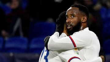 Lyon&#039;s French forward Moussa Dembele (R) celebrates with a teammate after scoring the opener during the French Ligue Cup quarterfinal football match between Olympique Lyonnais and Stade Brestois 29 at the Groupama stadium in Decines-Charpieu near Lyo