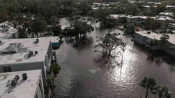 Flood waters sit in an apartment complex where people are being rescued in the aftermath of Hurricane Milton, Thursday, Oct. 10, 2024, in Clearwater, Fla. (AP Photo/Mike Stewart)