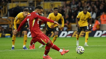 Soccer Football - Premier League - Wolverhampton Wanderers v Liverpool - Molineux Stadium, Wolverhampton, Britain - September 28, 2024 Liverpool's Mohamed Salah scores their second goal from the penalty spot REUTERS/Phil Noble EDITORIAL USE ONLY. NO USE WITH UNAUTHORIZED AUDIO, VIDEO, DATA, FIXTURE LISTS, CLUB/LEAGUE LOGOS OR 'LIVE' SERVICES. ONLINE IN-MATCH USE LIMITED TO 120 IMAGES, NO VIDEO EMULATION. NO USE IN BETTING, GAMES OR SINGLE CLUB/LEAGUE/PLAYER PUBLICATIONS. PLEASE CONTACT YOUR ACCOUNT REPRESENTATIVE FOR FURTHER DETAILS..