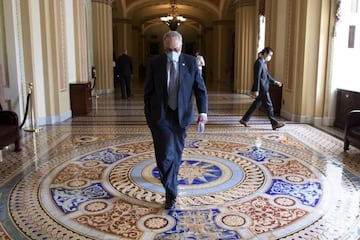 US Senate Minority Leader Democrat Chuck Schumer walks near the Senate chamber on Capitol Hill in Washington, DC, USA.