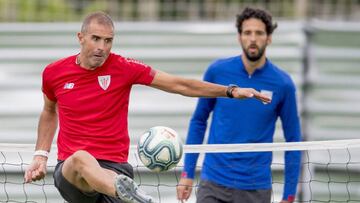 Garitano con Raúl García.