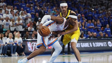 OKLAHOMA CITY, OKLAHOMA - JUNE 16: Shai Gilgeous-Alexander #2 of the Oklahoma City Thunder is defended by Andrew Nembhard #2 of the Indiana Pacers during the third quarter in Game Five of the 2025 NBA Finals at Paycom Center on June 16, 2025 in Oklahoma City, Oklahoma. NOTE TO USER: User expressly acknowledges and agrees that, by downloading and or using this photograph, User is consenting to the terms and conditions of the Getty Images License Agreement. Matthew Stockman/Getty Images/AFP (Photo by MATTHEW STOCKMAN / GETTY IMAGES NORTH AMERICA / Getty Images via AFP)