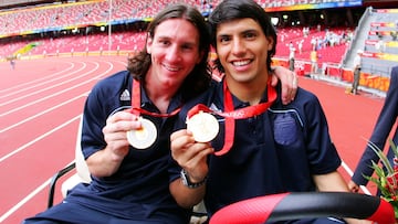 BEIJING - AUGUST 23: Argentinian forwards Lionel Messi (L) and Sergio Aguero gold medal pose during the men's Olympic football tournament medal ceremony at the national stadium in Beijing during the Men's Final between Nigeria and Argentina at the National Stadium on Day 15 of the Beijing 2008 Olympic Games on August 23, 2008 in Beijing, China. (Photo by Koji Watanabe/Getty Images)