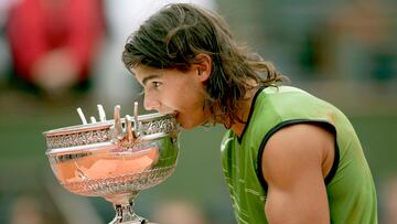 Rafael Nadal poses with the winners trophy after his 3-1 victory over Mariano Puerta at the French Open on June 5, 2005 in Paris, France.