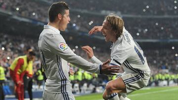 MADRID, SPAIN - JANUARY 04: James Rodriguez of Real Madrid celebrates with Luka Modric after scoring Real's 3rd goal during the Copa del Rey Round of 16 First Leg match between Real Madrid and Sevilla at Bernabeu on January 4, 2017 in Madrid, Spain. (Photo by Denis Doyle/Getty Images)