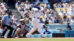 LOS ANGELES, CALIFORNIA - APRIL 21: Shohei Ohtani #17 of the Los Angeles Dodgers hits a two-run home run against pitcher Adrian Houser #35 of the New York Mets during the third inning for his 176 career home run at Dodger Stadium on April 21, 2024 in Los Angeles, California. Ohtani's 176th home is the most by a Japanese-born player.   Kevork Djansezian/Getty Images/AFP (Photo by KEVORK DJANSEZIAN / GETTY IMAGES NORTH AMERICA / Getty Images via AFP)