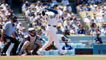 LOS ANGELES, CALIFORNIA - APRIL 21: Shohei Ohtani #17 of the Los Angeles Dodgers hits a two-run home run against pitcher Adrian Houser #35 of the New York Mets during the third inning for his 176 career home run at Dodger Stadium on April 21, 2024 in Los Angeles, California. Ohtani's 176th home is the most by a Japanese-born player.   Kevork Djansezian/Getty Images/AFP (Photo by KEVORK DJANSEZIAN / GETTY IMAGES NORTH AMERICA / Getty Images via AFP)