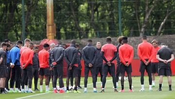 The Manchester United players and staff hold a minute silence in memory of the victims of the Manchester Concert attack during a Manchester United  training session ahead of the UEFA Europa League Final