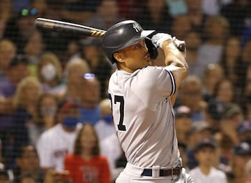 BOSTON, MA - SEPTEMBER 25: Giancarlo Stanton #27 of the New York Yankees connects for a grand slam home run against the Boston Red Sox in the eighth inning at Fenway Park on September 25, 2021 in Boston, Massachusetts.