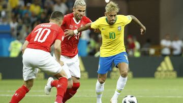 Rostov-on-don (Russian Federation), 17/06/2018.- Neymar (R) of Brazil and Valon Behrami (C) of Switzerland in action during the FIFA World Cup 2018 group E preliminary round soccer match between Brazil and Switzerland in Rostov-On-Don, Russia, 17 June 201