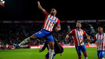 Girona's Venezuelan midfielder #21 Yangel Herrera celebrates after scoring his team's first goal during the Spanish league football match between Girona FC and RC Celta de Vigo at the Montilivi stadium in Girona on October 27, 2023. (Photo by Pau BARRENA / AFP)