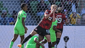 Canada's forward #12 Christine Sinclair (C) reacts after a missed chance on goal during the Australia and New Zealand 2023 Women's World Cup Group B football match between Nigeria and Canada at Melbourne Rectangular Stadium, also known as AAMI Park, in Melbourne on July 21, 2023. (Photo by WILLIAM WEST / AFP)