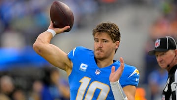 Dec 15, 2024; Inglewood, California, USA; Los Angeles Chargers quarterback Justin Herbert (10) warms up prior to the game against the Tampa Bay Buccaneers at SoFi Stadium. Mandatory Credit: Jayne Kamin-Oncea-Imagn Images