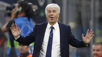 FILE - In this  Tuesday, Oct. 1, 2019 file photo, Atalanta coach Gian Piero Gasperini gives instructions during the Champions League group C soccer match between Atalanta and Shakhtar Donetsk at the San Siro stadium in Milan, Italy. Gasperini says he had 