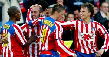 Perea, Colsa, Torres y Gronkjaer celebran un gol del Atlético.