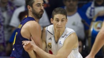 Juan Carlos Navarro y Jaycee Carroll.