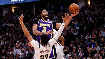 Feb 12, 2020; Denver, Colorado, USA; Los Angeles Lakers forward Anthony Davis (3) drives to the net against Denver Nuggets guard Jamal Murray (27) in the second quarter at the Pepsi Center. Mandatory Credit: Isaiah J. Downing-USA TODAY Sports