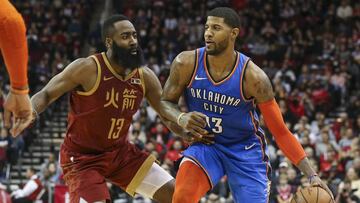 Feb 9, 2019; Houston, TX, USA; Oklahoma City Thunder forward Paul George (13) dribbles the ball as Houston Rockets guard James Harden (13) defends during the fourth quarter at Toyota Center. Mandatory Credit: Troy Taormina-USA TODAY Sports