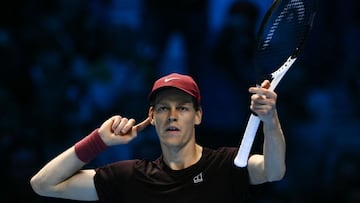 Italy's Jannik Sinner gestures during the men's single final match against Spain's Carlos Alcaraz at the ATP Finals tennis tournament, in Turin, on November 16, 2025. (Photo by Marco BERTORELLO / AFP)