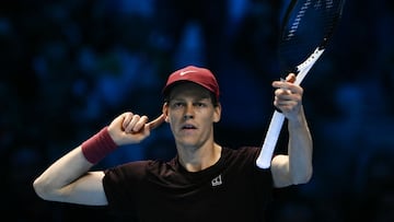 Italy's Jannik Sinner gestures during the men's single final match against Spain's Carlos Alcaraz at the ATP Finals tennis tournament, in Turin, on November 16, 2025. (Photo by Marco BERTORELLO / AFP)