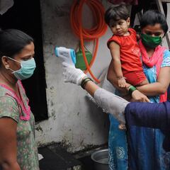 India registers another record Covid-19 spike amid doubts over deaths figures