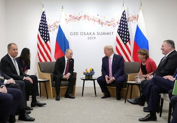 Russia's President Vladimir Putin and then US President Donald Trump attend a meeting on the sidelines of the G20 summit in Osaka, Japan June 28, 2019.