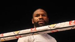 What record does Floyd Mayweather have and what titles does he still have to win?