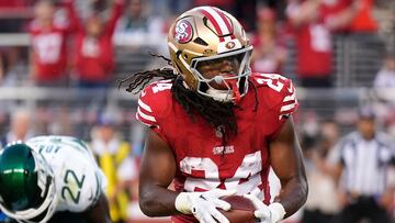 SANTA CLARA, CALIFORNIA - SEPTEMBER 09: Running back Jordan Mason #24 of the San Francisco 49ers scores a touchdown on a five-yard rush against the New York Jets during the third quarter at Levi's Stadium on September 09, 2024 in Santa Clara, California. Thearon W. Henderson/Getty Images/AFP (Photo by Thearon W. Henderson / GETTY IMAGES NORTH AMERICA / Getty Images via AFP)