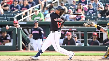 GOODYEAR, ARIZONA - FEBRUARY 27: Jose Ramirez #11 of the Cleveland Guardians hits an RBI single against the Oakland Athletics during the fourth inning of a spring training game at Goodyear Ballpark on February 27, 2024 in Goodyear, Arizona.   Norm Hall/Getty Images/AFP (Photo by Norm Hall / GETTY IMAGES NORTH AMERICA / Getty Images via AFP)