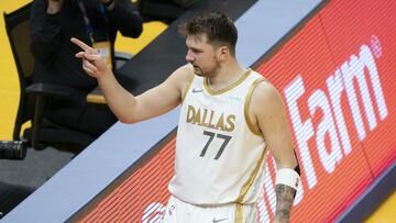 April 27, 2021; San Francisco, California, USA; Dallas Mavericks guard Luka Doncic (77) celebrates against the Golden State Warriors during the third quarter at Chase Center. Mandatory Credit: Kyle Terada-USA TODAY Sports