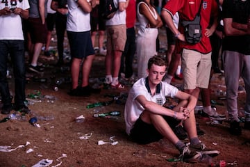 LONDON, ENGLAND  - JULY 11: England football fans react after their defeat as they watch the Hyde Park screening of the FIFA 2018 World Cup semi-final match between Croatia and England on July 11, 2018 in London, United Kingdom.The winner of this evening'