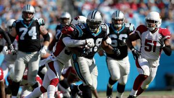 CHARLOTTE, NC - OCTOBER 30: Jonathan Stewart #28 of the Carolina Panthers runs the ball against D.J. Swearinger #36 of the Arizona Cardinals in the 2nd half during their game at Bank of America Stadium on October 30, 2016 in Charlotte, North Carolina. Streeter Lecka/Getty Images/AFP
== FOR NEWSPAPERS, INTERNET, TELCOS & TELEVISION USE ONLY ==