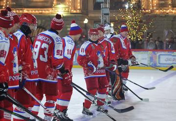 Vladimir Putin took part in the traditional Christmas day ice hockey exhibition match in Red Square and led his side to victory, scoring eight times in an 8-5 victory, according to the Associated Press and Reuters, although the Kremlin match report credit