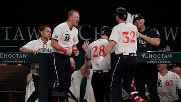 ARLINGTON, TEXAS - SEPTEMBER 22: Evan Carter #32 of the Texas Rangers celebrates with Josh Jung #6 after hitting a three-run home run during the third inning against the Seattle Mariners at Globe Life Field on September 22, 2023 in Arlington, Texas.   Sam Hodde/Getty Images/AFP (Photo by Sam Hodde / GETTY IMAGES NORTH AMERICA / Getty Images via AFP)