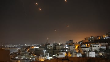HEBRON, WEST BANK - OCTOBER 01: Many rockets, fired from Iran, are seen over Jerusalem from Hebron, West Bank on October 01, 2024. The Israeli army announced that missiles were fired from Iran towards Israel and sirens were heard across the country, especially in Tel Aviv. (Photo by Wisam Hashlamoun/Anadolu via Getty Images)