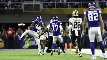 MINNEAPOLIS, MN - JANUARY 14: Stefon Diggs #14 of the Minnesota Vikings leaps to catch the ball in the fourth quarter of the NFC Divisional Playoff game against the New Orleans Saints on January 14, 2018 at U.S. Bank Stadium in Minneapolis, Minnesota. Diggs scored a 61-yard touchdown to win the game 29-24.   Hannah Foslien/Getty Images/AFP
 == FOR NEWSPAPERS, INTERNET, TELCOS &amp; TELEVISION USE ONLY ==