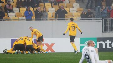 Soccer Football - Europa League - Group I - Olexandriya v AS Saint-Etienne - Arena Lviv, Lviv, Ukraine - November 7, 2019  Olexandriya&#039;s Maksim Zaderaka celebrates scoring their second goal with team mates while AS Saint-Etienne&#039;s Stephane Ruffi