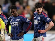 Soccer Football - Premier League - Brentford v Arsenal - GTech Community Stadium, London, Britain - February 12, 2026 Arsenal's Bukayo Saka and Declan Rice look dejected after Brentford's Keane Lewis-Potter scores their first goal Action Images via Reuters/Paul Childs EDITORIAL USE ONLY. NO USE WITH UNAUTHORIZED AUDIO, VIDEO, DATA, FIXTURE LISTS, CLUB/LEAGUE LOGOS OR 'LIVE' SERVICES. ONLINE IN-MATCH USE LIMITED TO 120 IMAGES, NO VIDEO EMULATION. NO USE IN BETTING, GAMES OR SINGLE CLUB/LEAGUE/PLAYER PUBLICATIONS. PLEASE CONTACT YOUR ACCOUNT REPRESENTATIVE FOR FURTHER DETAILS..