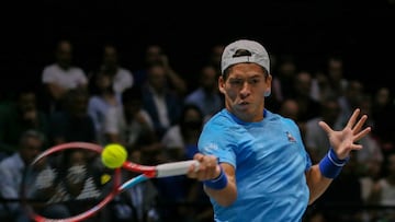 BOLOGNA, ITALY - SEPTEMBER 16: Sebastian Baez of Argentina returns a forehand to Matteo Berrettini of Italy during the Davis Cup Group Stage 2022 Bologna match between Italy and Argentina at Unipol Arena on September 16, 2022 in Bologna, Italy. (Photo by Giampiero Sposito/Getty Images)