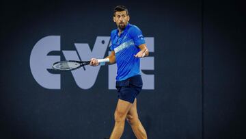 Serbia's Novak Djokovic reacts during his men's singles quarter-final match against USA's Reilly Opelka at the Brisbane International tennis tournament in Brisbane on January 3, 2025. (Photo by Patrick HAMILTON / AFP) / --IMAGE RESTRICTED TO EDITORIAL USE - STRICTLY NO COMMERCIAL USE--
